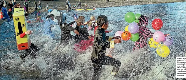  ?? BARRY HARCOURT 634426862 ?? About 30 year 6 students from Te Anau School braved the icy waters of Lake Te Anau to raise money for their camp in November. Te Anau School principal Grant Excell said the morning frost was the hardest Te Anau has had this year. ‘‘She was pretty...