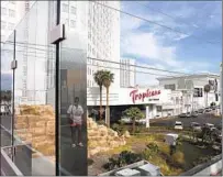  ?? JOHN LOCHER AP FILE ?? The Tropicana was the most expensive hotel-casino built in Las Vegas when it opened in 1957 at a cost of $15 million.