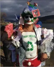  ?? BY PAUL POST ?? Ariel Santiago, of Amsterdam, dressed up like “Recycle Man” as part of an anti-littering campaign.