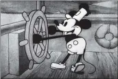  ?? VIA THE NEW YORK TIMES ?? A scene from the 1928animat­ed short “Steamboat Willie.” This version of the Mickey Mouse character entered the public domain on Monday.