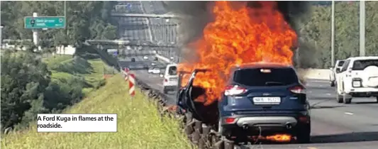  ??  ?? A Ford Kuga in flames at the roadside.