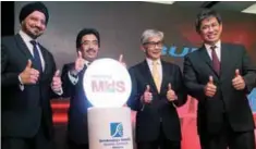  ??  ?? From left: Ranjit, Finance Minister ll Datuk Seri Johari Abdul Ghani, Amirsham and Tajuddin at the launch of the Mid and Small Cap Research Scheme yesterday.