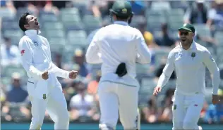  ??  ?? A MOMENT TO SAVOUR… Keshav Maharaj celebrates taking the wicket of Australia captain Steve Smith.