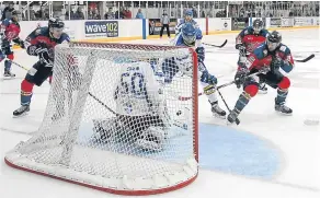  ??  ?? Fife Flyers goalie Shane Owen saves this attempt from CCS Stars’ Scott Brannon. Scott is hoping for better luck this weekend.