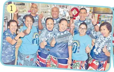  ?? Picture:ATU RASEA ?? 1
Staff of the Prouds Central Building in Suva celebrate Fiji Day with their outfits.