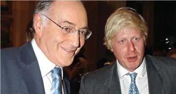  ??  ?? PAST AND PRESENT: Lord Howard with Boris Johnson at The Travellers’ Club in London, 2004