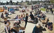  ?? DAN COYRO — SANTA CRUZ SENTINEL ?? People visit Capitola Beach to enjoy the warm weather last May. The U.S. Census Bureau on Monday released the 2020 population count.