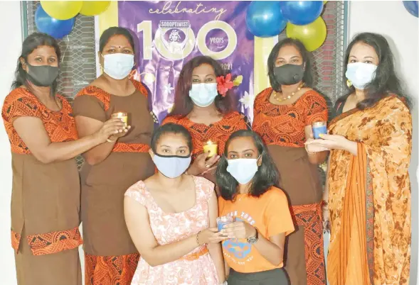  ?? ?? Soroptimis­t Internatio­nal Lautoka Club president, Zareena Bi (standing, middle) with the club members at the 100 years anniversar­y on September 21, 2021.