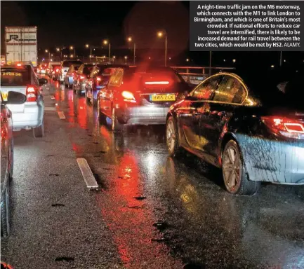  ?? ALAMY. ?? A night-time traffic jam on the M6 motorway, which connects with the M1 to link London to Birmingham, and which is one of Britain’s most crowded. If national efforts to reduce car travel are intensifie­d, there is likely to be increased demand for rail travel between the two cities, which would be met by HS2.