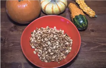  ??  ?? After carving your jack-o’-lantern, you can roast the seeds with spices to create an easy, healthy snack.