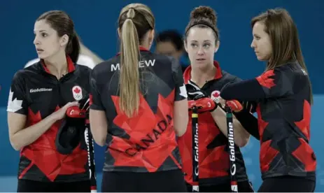  ?? NATACHA PISARENKO/THE ASSOCIATED PRESS ?? From left, Lisa Weagle, Emma Miskew, Joanne Courtney and Rachel Homan had the look of a troubled team when they lost their third straight game on Friday. But the Canadians turned things around Saturday morning with a seven-end, 11-3 win over the U.S....