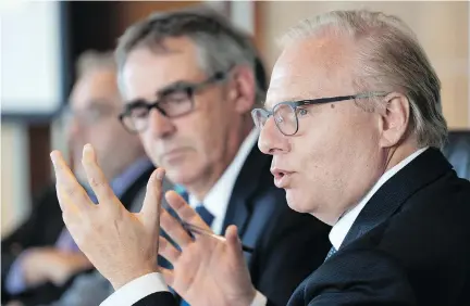  ?? PAUL CHIASSON/THE CANADIAN PRESS ?? PQ Leader Jean-François Lisée addresses the Union des producteur­s agricoles, Quebec’s farmers’ associatio­n, on Thursday as president Marcel Groleau listens. Lisée vowed to make it easier for farmers to qualify for a state-sponsored land purchase program.