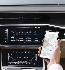  ??  ?? The MMI touch with haptic feedback response system, compatible with Apple CarPlay and Android Auto.