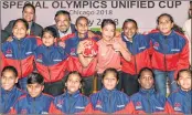  ??  ?? Mary Kom (C) poses for a group photo at the send-off ceremony of Indian contingent for Special Olympics Unified Cup on Wednesday.