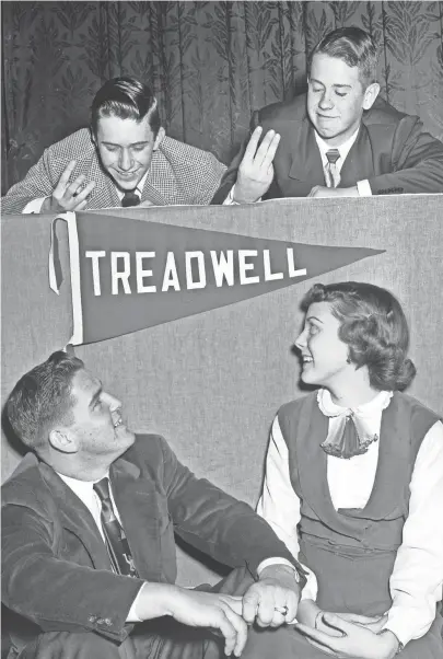  ?? THE COMMERCIAL APPEAL FILES ?? Treadwell High School made it three in a row on the Quiz ’Em on the Air Contest on 10 Feb 1951 as Tommy Graham, top left, and Joe Spann, top right, members of the team, indicate with upraised fingers. Also on the team are Billy Caldbeck, lower left, and Mary Anne Sellers.