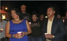  ??  ?? Yulil Alonzo-Garza and husband Martin Garza Sr. at Brownies’ Diner during the fourth candleligh­t vigil to honor their slain son, Martin Alberto Garza. WILLIAM ROLLER FILE PHOTO