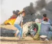  ?? Picture / AP ?? Palestinia­n youths have been gathering tyres.