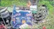  ?? PTI ?? Wreckage of the bus after it fell into a deep gorge, in Uttarkashi.