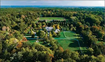  ?? Contribute­d by Sotheby’s Internatio­nal Realty ?? Oldfield Farm at 160 John Street is offered to the market for $12.5 million. At the heart of the 18.39-acre equestrian estate is an eternally elegant nine-bedroom, fully restored main house. The property, listed by Joseph Barbieri of Sotheby’s in Greenwich, also affords a pool, tennis court, wine cellar, home gym, a theater and complete equestrian amenities.