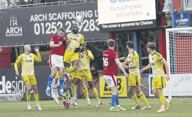  ?? ?? Action from Halifax Town’s FA Trophy victory at Aldershot. Pic: Ian Moorsman