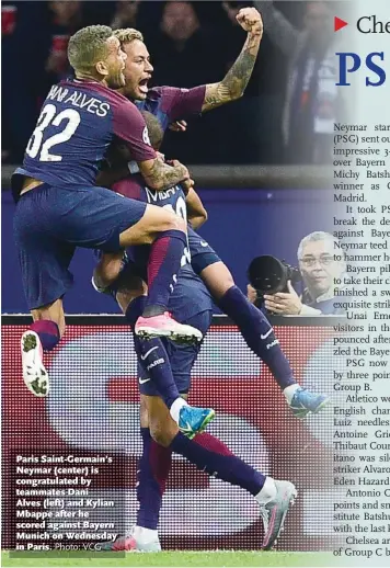  ?? Photo: VCG ?? Paris Saint-Germain’s Neymar (center) is congratula­ted by teammates Dani Alves (left) and Kylian Mbappe after he scored against Bayern Munich on Wednesday in Paris.