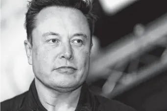  ?? Liesa Johannssen-Koppitz / Bloomberg file photo ?? Elon Musk, chief executive officer of Tesla, is moving to buy Twitter, offering $43 billion, while the company has adopted a “poison pill” plan to thwart that.