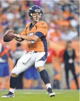  ?? RON CHENOY, USA TODAY SPORTS ?? Seventh- round draft pick Trevor Siemian again won the Broncos’ quarterbac­k competitio­n.