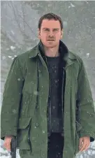  ?? UNIVERSAL PICTURES ?? Michael Fassbender plays a detective on the trail of a serial killer in "The Snowman."