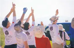  ??  ?? Student rocketeers and spectators watch a launch during the third annual Spaceport America Cup. The intercolle­giate rocket engineerin­g competitio­n attracted more than 120 teams from the United States and other countries.