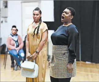  ?? TERRENCE ANTONIO JAMES/CHICAGO TRIBUNE ?? Performers Lauren Michelle, left, and Whitney Morrison rehearse the Chicago Opera Theater company’s new opera “Freedom Ride” at the Fine Arts Building on Jan. 24.