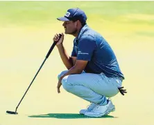  ?? EMIL LIPPE/ASSOCIATED PRESS ?? Sebastián Muñoz, of Colombia, looks over the green before putting on the 18th hole Thursday during the first round of the AT&T Byron Nelson in McKinney, Texas.