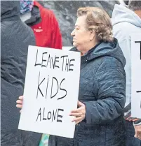  ?? LARS HAGBERG ;THE CANADIAN PRESS FILE PHOTO ?? Anti-vaccine protests, like this one Kingston on Nov. 14, have ramped up their rhetoric with availabili­ty of children’s vaccines.