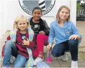  ?? Picture: LEBOGANG TLOU ?? HAVING EARLY GLAMWHICHE­S: Enjoying Tekkie Tax Day at Kowie Foundation School last Friday were, from left, Grade 3 pupils Kyra h Wright, Olilitha Mamase and Lana Hensens