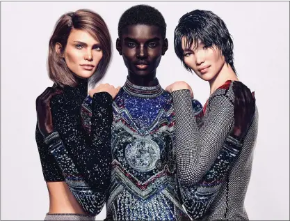  ?? BALMAIN VIA THE NEW YORK TIMES ?? Fashion label Balmain’s digital models include, Margot, left, Shudu and Zhi. Balmain commission­ed photograph­er Cameron-James Wilson to create a “virtual army” of digital personalit­ies. Virtual influencer­s are on the rise and come with several advantages for companies.