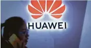  ?? Wang Zhao / AFP/Getty Images ?? The United States says Chinese telecom giant Huawe is a conduit for cyber espionage.