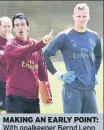  ??  ?? MAKING AN EARLY POINT: With goalkeeper Bernd Leno