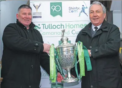  ??  ?? Argyll and Bute councillor for Oban South and the Isles Roddy McCuish and president of the Camanachd Associatio­n Keith Loades with the Camanachd Cup.