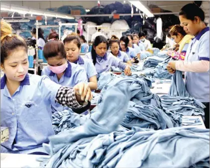  ?? HONG MENEA ?? Garment workers at a factory in Phnom Penh.The Kingdom exported $10 billion worth of apparel to the EU last year.