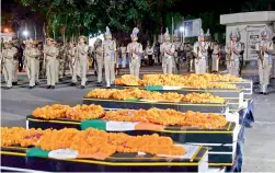  ?? — PTI ?? Jawans give gun salute to martyred CRPF personnel at Patna on Tuesday.