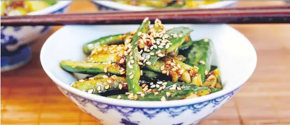  ?? PHOTOS: KAREN BARNABY ?? Nothing beats a cool cucumber salad in the summer. This Sichuan version lets you turn up the heat by adding a little — or a lot — of chili oil.