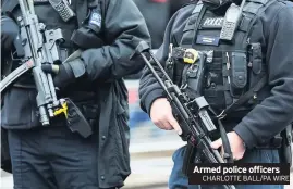  ?? CHARLOTTE BALL/PA WIRE ?? Armed police officers