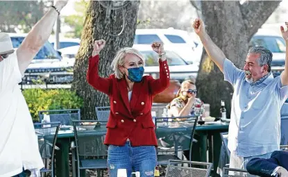  ?? Tom Reel / Staff photograph­er ?? Trish DeBerry celebrates her lead in the Republican runoff for the Commission­ers Court Precinct 3 at her election night party.