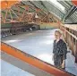  ?? [PHOTO BY STEVE GOOCH,
THE OKLAHOMAN] ?? Allison Bailey surveys the steel roof that will be exposed as part of redevelopm­ent at 1212 N Hudson Ave.