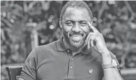 ?? PAUL A. HEBERT/INVISION/AP ?? Idris Elba, who plays Nelson Mandela in "Mandela: Long Walk to Freedom,” is considered an Oscar front-runner this awards season.