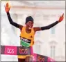  ?? PHOTO: AP ?? Kenya’s Peres Jepchirchi­r crosses the finish line to win the women’s race at the London Marathon yesterday.