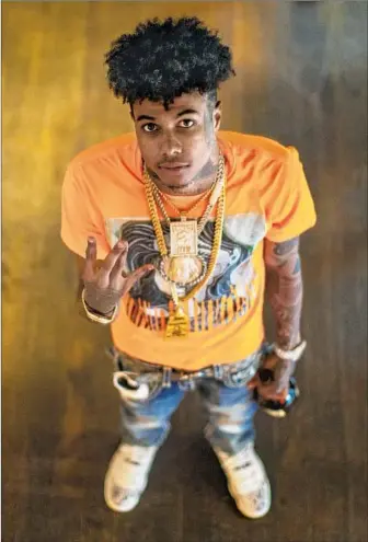  ?? Gina Ferazzi Los Angeles Times ?? “I AIN’T GOING nowhere,” proclaims L.A. rapper Blueface, who has a debut album in the works.