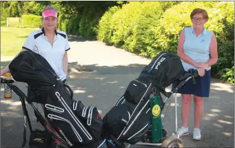  ??  ?? Claire Murphy and Katie Sheehan enjoying a round of golf in Courtown.