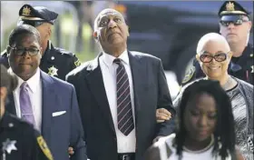  ?? Matt Rourke/Associated Press ?? Bill Cosby arrives for his sexual assault trial Monday with his wife, Camille, at the Montgomery County Courthouse in Norristown.