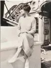  ?? CHANEL PRIVATE COLLECTION PHOTO ?? Gabrielle Chanel on the desk of the Flying Cloud circa 1926.