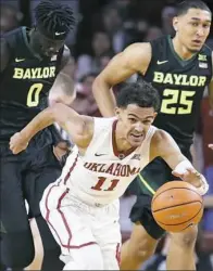  ?? Sue Ogrocki/Associated Press ?? Oklahoma freshman guard Trae Young leads Division I in scoring and assists.